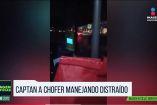 Chofer maneja con celular en la mano en ruta 209