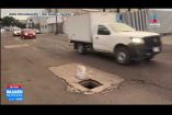 Vecinos y automovilistas reportaron un registro de agua y alcantarillado sin tapa metálica ubicado a mitad de la calzada sobre Prolongación Pino Suárez, entre el Periférico Norte y el Bulevar del Rodeo, en la Col. El Vigía de #Zapopan.