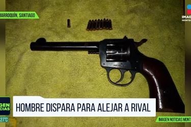 Hombre dispara para alejar a rival en Santiago